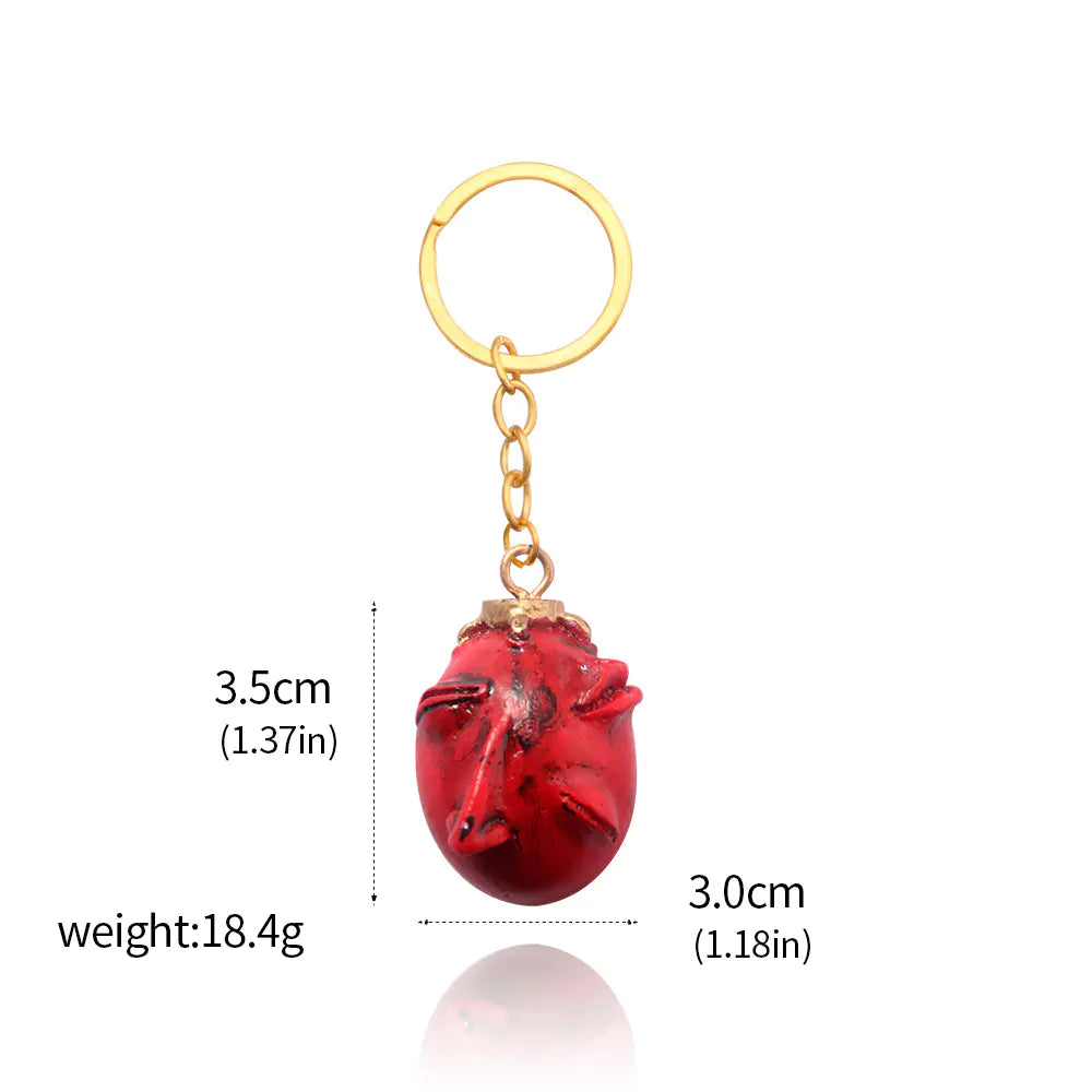 Windblade Pendant - Red keychain with nose and mouth 