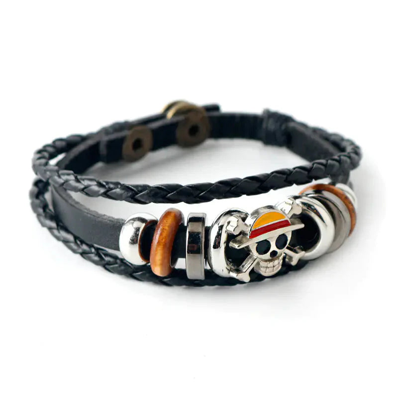 Uzumaki x Luffy x Levi Wrap One Piece anime bracelet detail shot - Black braided leather bracelet with skull and crossbones design 