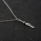 Silver anime-inspired hook pendant necklace from Shonen Realm Apparel